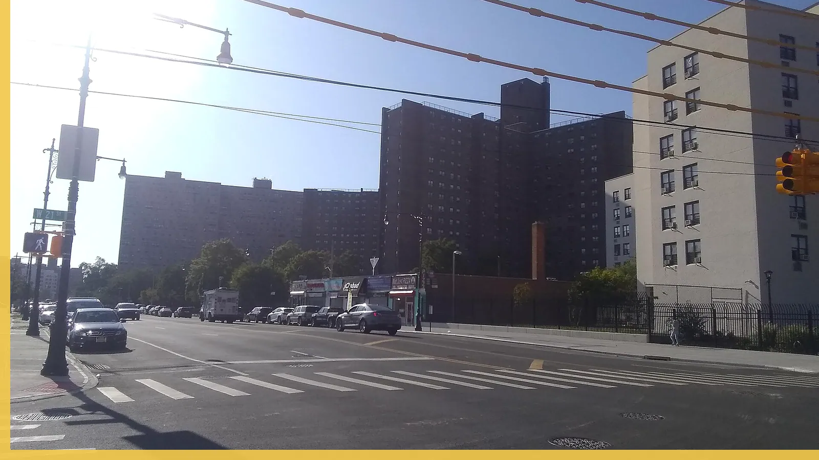 A Brooklyn neighborhood streetscape illustrating amusement parks in Coney Island